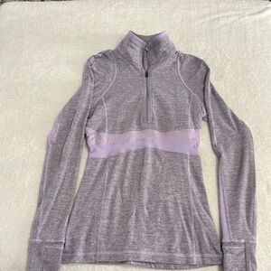 Lululemon Athletica Gray and Purple Fitted 1/4 zip pullover with ruffle trim